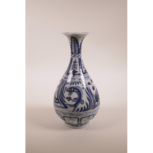 50 - A Chinese Ming style blue and white porcelain pear shaped vase with a flared rim, and carp decoratio... 