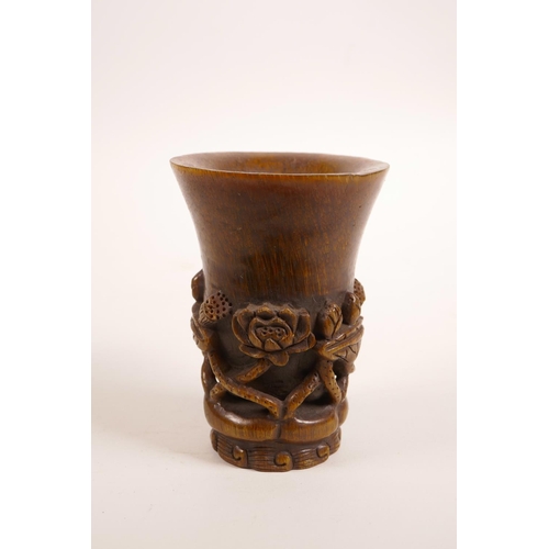 52 - A Chinese faux horn libation cup with carved lotus flower decoration, 4