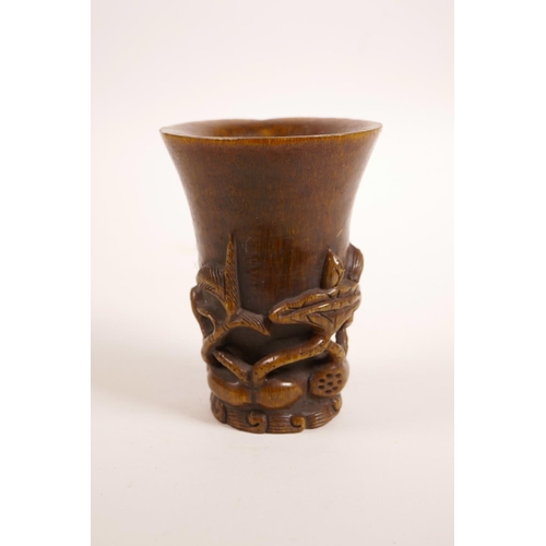 52 - A Chinese faux horn libation cup with carved lotus flower decoration, 4