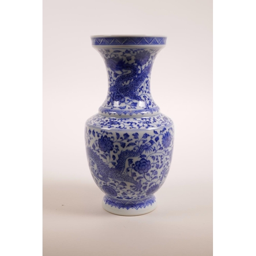 58 - A Chinese blue and white porcelain vase decorated with dragons on a scrolling floral ground, seal ma... 