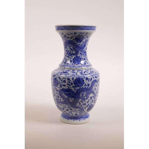 58 - A Chinese blue and white porcelain vase decorated with dragons on a scrolling floral ground, seal ma... 