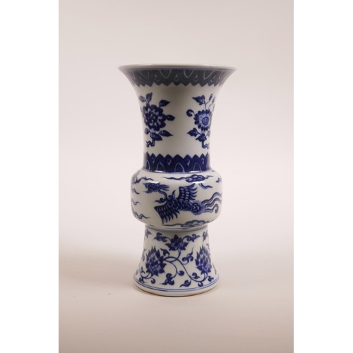 73 - A Chinese blue and white porcelain gu shaped vase decorated with phoenix and lotus flowers, 6 charac... 