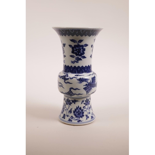 73 - A Chinese blue and white porcelain gu shaped vase decorated with phoenix and lotus flowers, 6 charac... 