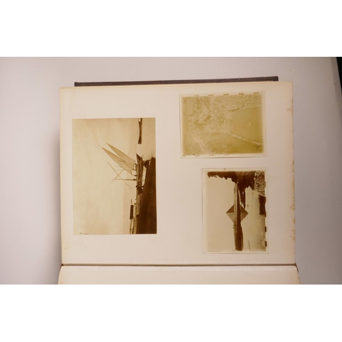 74 - A good early C20th photograph album depicting topographical scenes from around the world, some possi... 