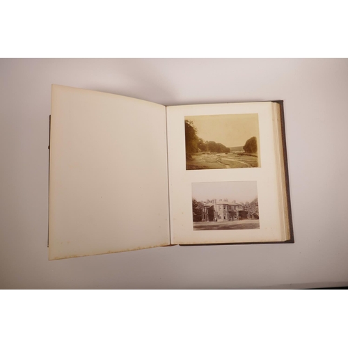 74 - A good early C20th photograph album depicting topographical scenes from around the world, some possi... 