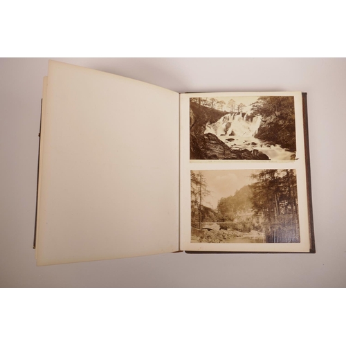 74 - A good early C20th photograph album depicting topographical scenes from around the world, some possi... 