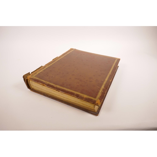 74 - A good early C20th photograph album depicting topographical scenes from around the world, some possi... 