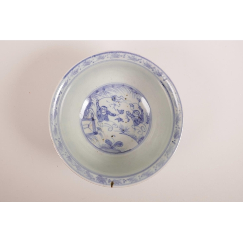 75 - A Chinese blue and white porcelain rice bowl decorated with flying kites, 5½