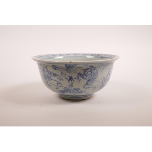 75 - A Chinese blue and white porcelain rice bowl decorated with flying kites, 5½