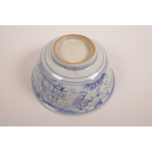 75 - A Chinese blue and white porcelain rice bowl decorated with flying kites, 5½