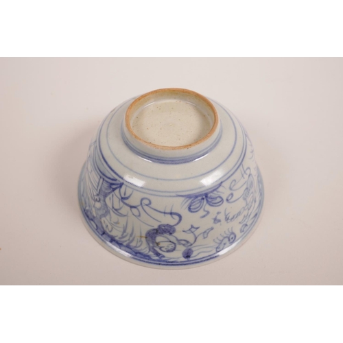 75 - A Chinese blue and white porcelain rice bowl decorated with flying kites, 5½