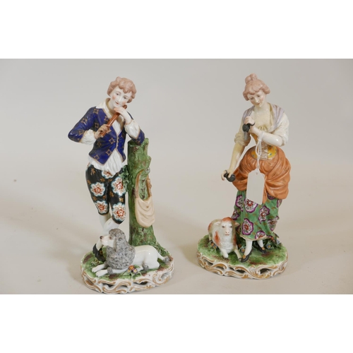 79 - A pair of C19th Continental hard paste porcelain figures of a shepherd with a flute and shepherdess ... 