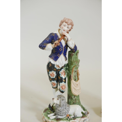 79 - A pair of C19th Continental hard paste porcelain figures of a shepherd with a flute and shepherdess ... 