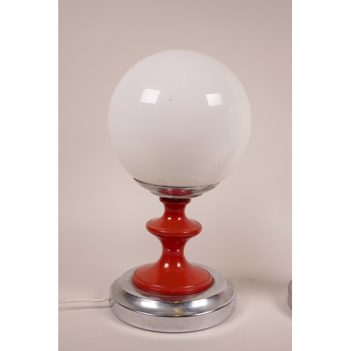 9 - A pair of retro table lamps with glass ball shades, 10½