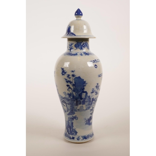 10 - An early C20th Chinese blue and white jar and cover, decorated with women and children in a garden, ... 