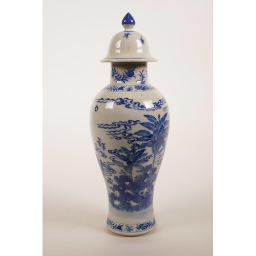 10 - An early C20th Chinese blue and white jar and cover, decorated with women and children in a garden, ... 