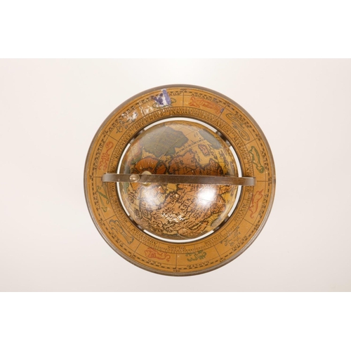 13 - A miniature composition terrestrial globe, 9