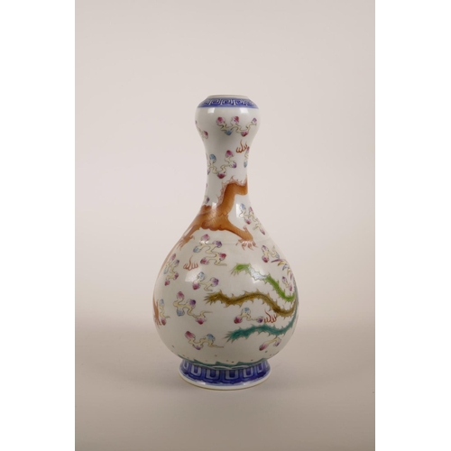 3 - A Chinese polychrome porcelain garlic head shaped vase decorated with a dragon and phoenix chasing t... 