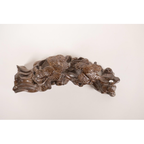 50 - A Chinese carved hardwood brush rest in the form of a tree root, 8