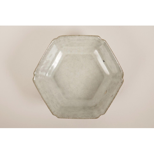 55 - A Chinese celadon glazed hexagonal pottery dish, 6½