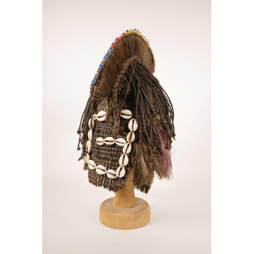 177 - An African tribal woven hair and shell mask