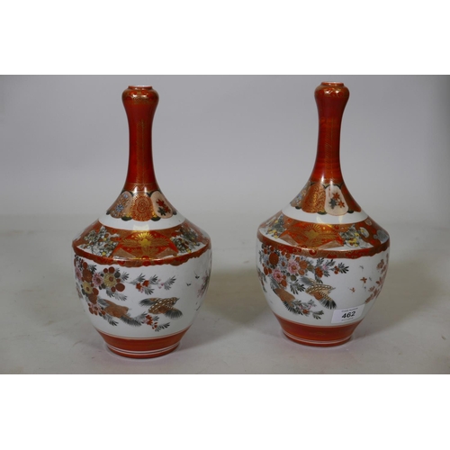 344 - A pair of Meiji Kutani vases with finely painted decoration, with gilt highlights of birds, insects ... 