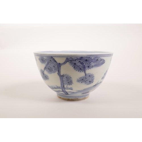 133 - A Chinese blue and white porcelain rice bowl decorated with figures in a landscape, 6 character mark... 