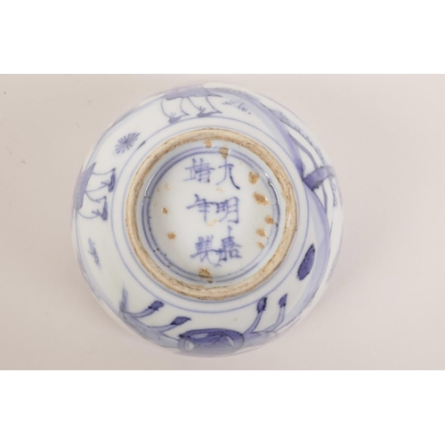 133 - A Chinese blue and white porcelain rice bowl decorated with figures in a landscape, 6 character mark... 