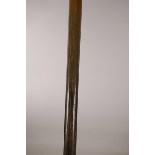 144 - A French late C19th early C20th rhinoceros horn walking stick with high carat gold mount, 36½