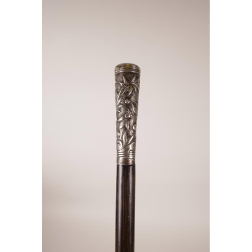 15 - A Chinese bamboo swagger stick with a white metal mount decorated with birds and insects, 32