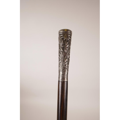 15 - A Chinese bamboo swagger stick with a white metal mount decorated with birds and insects, 32