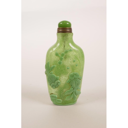 176 - A Chinese Peking glass snuff bottle with carved lotus pond decoration, 3