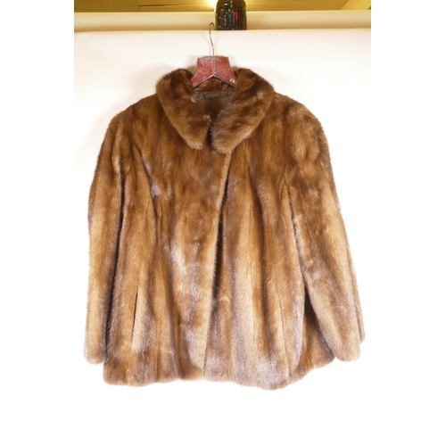 179 - A vintage mink fur jacket with silk lining