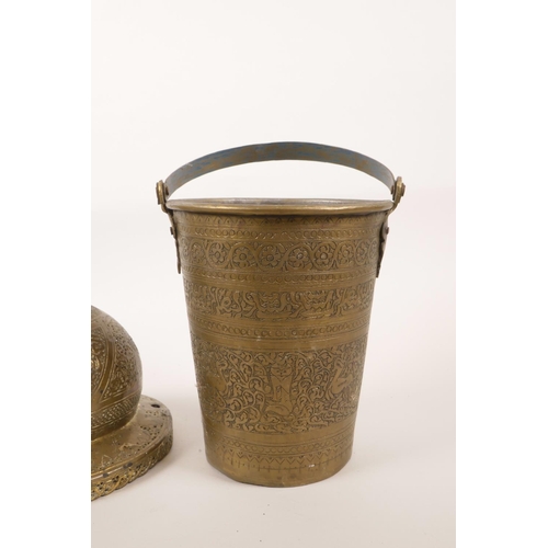 22 - A brass Indo-Persian pot cover with chased script decoration, together with a similar bucket, 7½