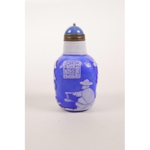 36 - A Chinese blue and white Peking glass snuff bottle decorated with figures in a landscape scene, 3