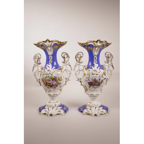 38 - A pair of Continental porcelain two handled urns with floral decoration and gilt highlights, A/F rep... 