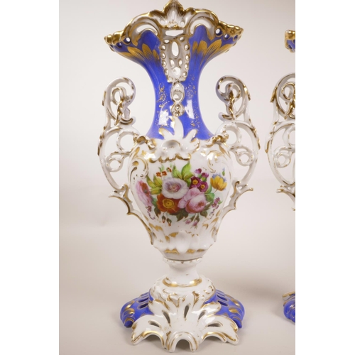 38 - A pair of Continental porcelain two handled urns with floral decoration and gilt highlights, A/F rep... 