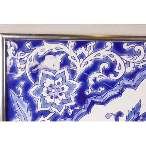 49 - An Eastern blue and white six tile panel depicting an urn with flowers, 16