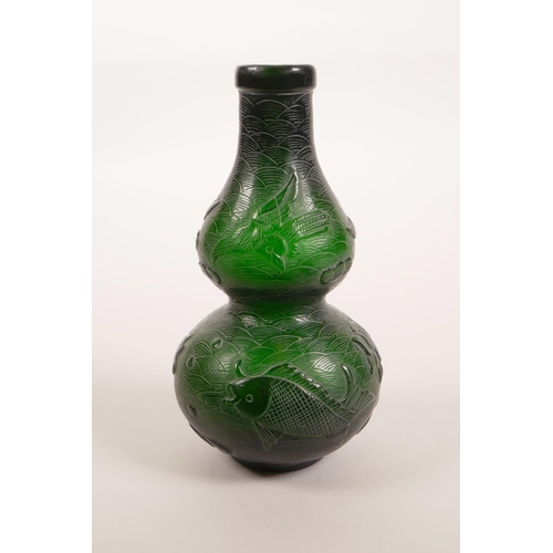 60 - A Chinese Peking glass double gourd vase decorated with carp, lotus flowers and birds, seal mark to ... 