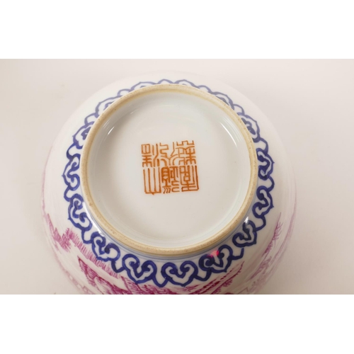 66 - A Chinese blue and white porcelain rice bowl decorated with a puce enamel landscape scene, seal mark... 