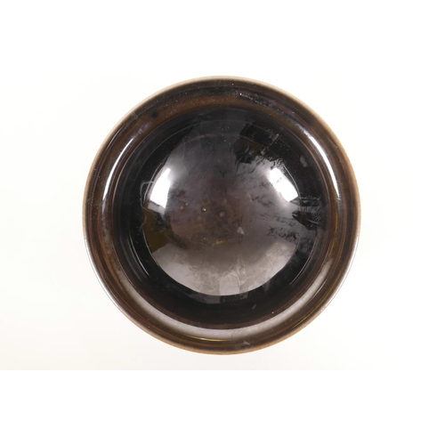 70 - A Chinese porcelain rice bowl with a deep brown mirror glaze, 6 character mark to base, 5½