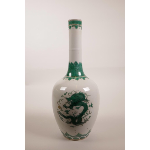 93 - A Chinese famille verte enamelled porcelain vase with a long slender neck, decorated with a dragon c... 