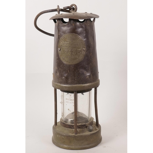 94 - An early miner's lamp made by the Protector Lamp Lighting Company of Eccles, Manchester, lamp type C... 