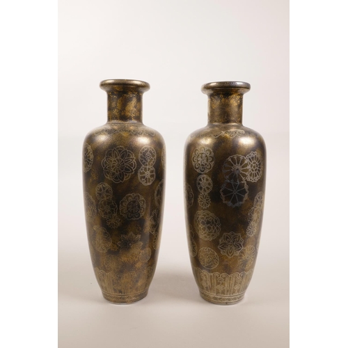 95 - A pair of Chinese porcelain vases with silvered decoration, 4 character mark to base, 8