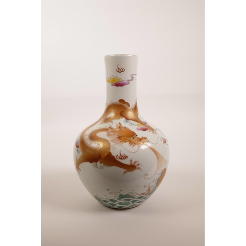 98 - A Chinese polychrome porcelain vase with dragon and carp decoration, seal mark to base, 9½