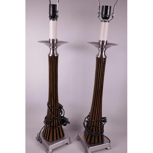 1129 - A pair of contemporary tall ribbed column table lamps, 27