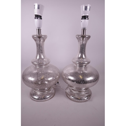 1133 - A pair of flecked glass bulbous base table lamps, 18