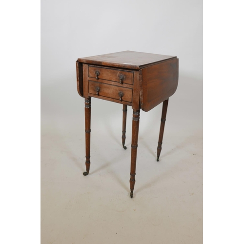 1134 - A George III mahogany drop leaf table with two end drawers, raised on ring turned supports, 20