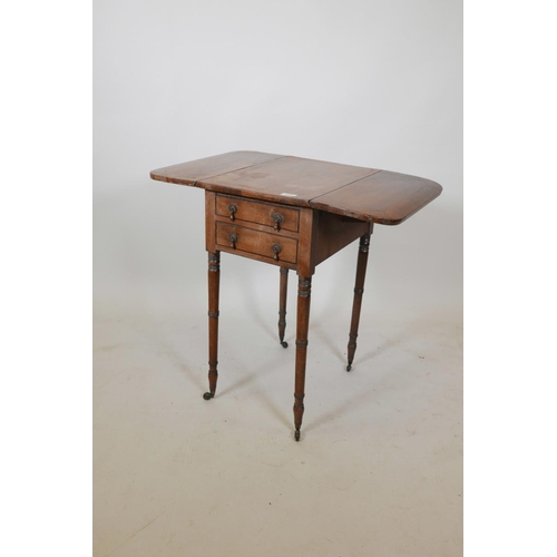 1134 - A George III mahogany drop leaf table with two end drawers, raised on ring turned supports, 20