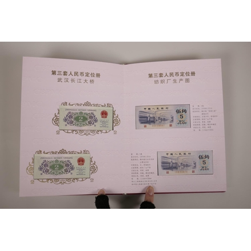 13 - A collector's wallet of Chinese facsimile (replica) 50s and 60s banknotes of assorted denominations,... 